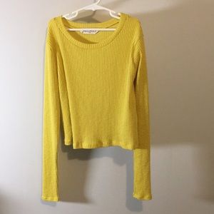 Mustard colored long sleeved crop top